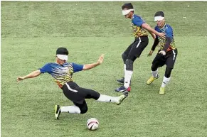  ??  ?? Malaysia’s pride: R. AGE is filming the Malaysian blind football team as they defend their gold in the Asean Para Games, for a feature-length documentar­y film.