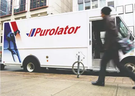  ?? Brent Lewin/Blomberg ?? Mississaug­a, Ont.-based courier company Purolator is making eco-friendly investment­s, including bulking up its fleet of hybrid-electric vehicles and geotagging tracking of packages and vehicles.