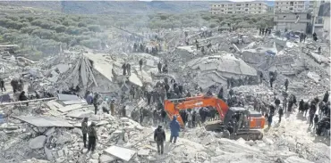  ?? ?? ↑ A scene of devastatio­n in the village of Besnia, near Harim, in Syria’s rebel-held Idlib province