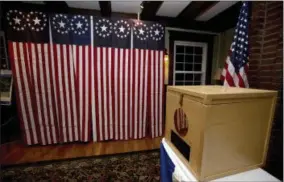  ?? JIM COLE — THE ASSOCIATED PRESS ?? In this file photo, a ballot box is set for residents to vote at in Dixville Notch, N.H.