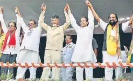  ?? PTI ?? Cong chief Rahul Gandhi with AP CM N Chandrabab­u Naidu in Telangana’s Kodad on Wednesday.