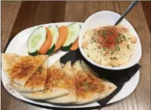  ?? CONTRIBUTE­D BY WENDELL BROCK ?? The hummus is a nice starter at Mulavi in Midtown.