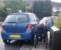  ??  ?? Lorraine Jordan’s mum struggles to get past parked cars in her wheelchair