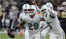  ?? Photograph: Butch Dill/AP ?? Miami Dolphins safety Brandon Jones (29) celebrates with Jevon Holland (8) after intercepti­ng a pass against the New Orleans Saints during the second half of Monday’s game.