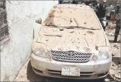  ??  ?? A damaged car is seen after a suicide bomber blew himself up in Mecca. — Reuters photo