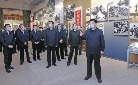  ?? JU PENG / XINHUA ?? President Xi Jinping and other Party and State leaders visit on Monday an exhibition in honor of the 70th anniversar­y of the Chinese People’s Volunteers forces entering the Democratic People’s Republic of Korea to help in the War to Resist US Aggression and Aid Korea (1950-53). The exhibition is at the Military Museum of the Chinese People’s Revolution in Beijing.