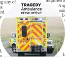  ??  ?? TRAGEDY Ambulance crew arrive