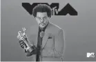  ?? [MTV] ?? The Weeknd accepts the video of the year award for “Blinding Lights” during the MTV Video Music Awards.