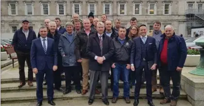  ??  ?? Right: Farmers from Cork, Kerry, Limerick and Tipperary staging a protest outside Leinster House over the new hen harrier scheme.