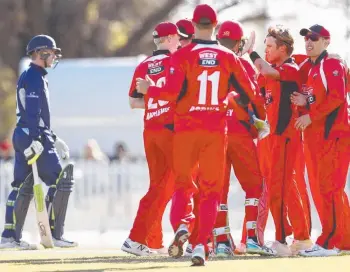  ?? Picture: AAP ?? GOT HIM: South Australia players celebrate after dismissing Mackenzie Harvey yesterday.