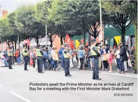  ?? ROB BROWNE ?? Protesters await the Prime Minister as he arrives at Cardiff Bay for a meeting with the First Minister Mark Drakeford