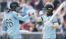  ??  ?? RECORD-BREAKER Eoin Morgan, right, smashed 17 sixes