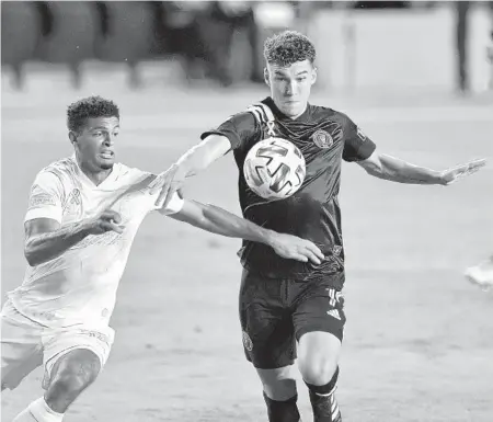  ?? MICHAEL LAUGHLIN/SUN SENTINEL ?? Inter Miami forward Robbie Robinson was the first pick in the 2020 MLS SuperDraft.