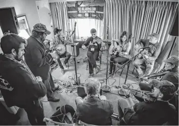  ?? [PHOTO PROVIDED BY PHIL CLARKIN] ?? Okie artists perform inside The Oklahoma Room at Folk Alliance 2015.