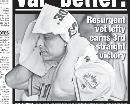  ?? AP ?? RALLY TOWEL: Jason Vargas, who allowed one run on four hits while striking out six, wipes his head during the Mets’ 10-3 victory over the Cubs on Wednesday.