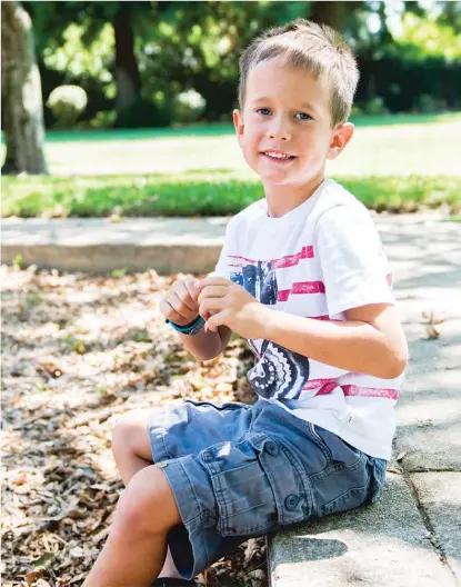  ?? | HEIDI DE MARCO/ KHN ?? Landon Morris, 6, sits at the park near his house in Yuba City, California. Jessica Morris says her son leads a normal life, despite his hemophilia diagnosis.