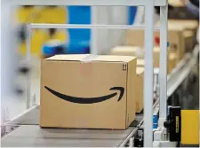  ?? DAVID ZALUBOWSKI THE ASSOCIATED PRESS FILE PHOTO ?? Amazon’s paid subscripti­on service provides free delivery for online shopping across Canada, except for remote locations. While customers in Iqaluit qualify for the offer, all other communitie­s in Nunavut are excluded.