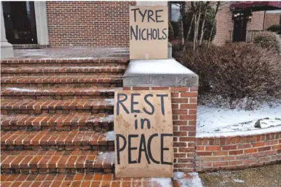  ?? SETH HERALD/AFP VIA GETTY IMAGES/TNS ?? Signs are placed outside the Mississipp­i Boulevard Christian Church on Feb. 1 after the funeral for Tyre Nichols in Memphis.