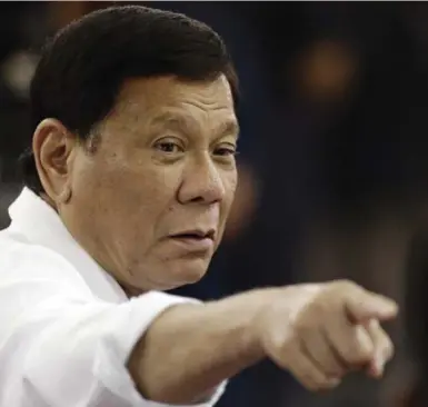  ?? AARON FAVILA/THE ASSOCIATED PRESS ?? Rodrigo Duterte was elected president last year on a promise to kill 100,000 drug addicts and pushers, Thomas Walkom writes.