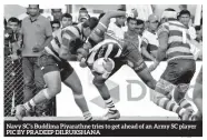  ?? PIC BY PRADEEP DILRUKSHAN­A ?? Navy SC’S Buddima Piyarathne tries to get ahead of an Army SC player