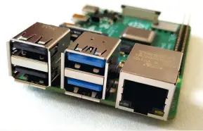  ??  ?? The new USB and Ethernet ports are in different positions to earlier boards, breaking compatibil­ity with older cases. Under the control of “Big Case”.