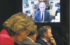  ?? Win McNamee / AP ?? Senators listen as Dr. Anthony Fauci, director of the National Institute of Allergy and Infectious Diseases, speaks remotely during a virtual Senate Committee for Health, Education, Labor, and Pensions hearing, on Capitol Hill on May 12. On May 15, the Associated Press reported on stories circulatin­g online incorrectl­y asserting Fauci has sat on Microsoft’s board of directors with Bill Gates as his boss. Fauci has become a target of misinforma­tion as he oversees the U.S. response to the COVID-19 pandemic.