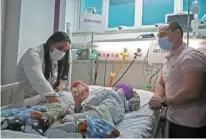  ?? Photo: — Rio de Janeiro State Health Department/AFP ?? Brazilian conjoined twins Bernardo (left, with mum adriely) and arthur (with dad antonio) after their operation.