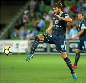  ?? PHOTO: HAMISH BLAIR ?? STEPPING UP: Milos Ninkovic delivers the ball forward for Sydney FC during their win over Melbourne City.