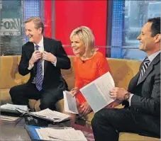  ?? Rob Kim Getty Images ?? STEVE DOOCY, left, Gretchen Carlson and Brian Kilmeade host “Fox and Friends” on Feb. 13, 2013, at Fox Studios in New York City.