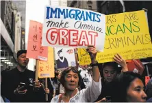 ?? Jewel Samad / AFP / Getty Images 2017 ?? Demonstrat­ing for the Deferred Action for Childhood Arrivals legislatio­n rally near Trump Tower in New York in 2017.