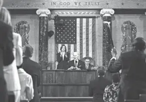  ?? SHAWN THEW/POOL VIA AP ?? President Joe Biden delivers the State of the Union address to a joint session of Congress at the Capitol on March 7 in Washington D.C. Standing at left is Vice President Kamala Harris and seated at right is House Speaker Mike Johnson, R-LA.