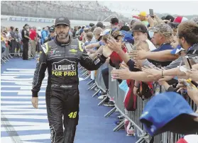  ??  ?? 600 AND COUNTING: Jimmie Johnson is still a big hit with the fans as he readies for his 600th career NASCAR start at today’s Cup Series race at Pocono Raceway in Long Pond, Pa.