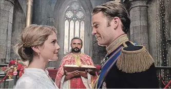  ?? NETFLIX ?? Rose McIver and Ben Lamb find love — love! — in A Christmas Prince: A Royal Wedding.