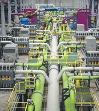  ?? PHOTOS BY EMILIO MORENATTI, AP ?? The pipeline that transports seawater to filters at Europe’s largest desalinati­on plant for drinking water in Barcelona, Spain.