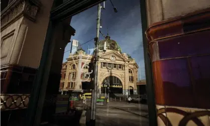  ?? Photograph: Darrian Traynor/Getty Images ?? The pandemic has led to an exodus of temporary migrants and internatio­nal students in Melbourne and other Australian cities amid lockdowns and internatio­nal border closures.