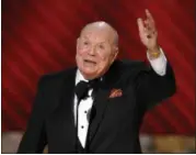  ?? MARK J. TERRILL — THE ASSOCIATED PRESS FILE ?? Don Rickles is honored for best individual performanc­e in a variety or music program for “Mr. Warmth: The Don Rickles Project,” at the 60th Primetime Emmy Awards in Los Angeles, in this file photo. Rickles, the hollering, bald-headed “Merchant of...
