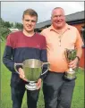  ??  ?? L to R: William MacCrone with The MacBrayne Cup and Graham Davidson with the Willie MacAlliste­r Cup.