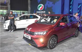  ?? Bernama photo ?? In total, Perodua has secured 10,000 bookings, with about 2,000 new bookings received since Jan 3, while another 8,000 units (old Bezza) which were booked last year, will also be receiving the new facelift 2020 Perodua Bezza.—