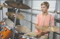  ??  ?? Braden Crosson, 14, plays drums.