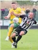  ??  ?? Caernarfon’s Jamie Breese wins this challenge