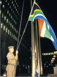  ?? Pic: Cameron Spencer/Getty Images ?? Clockwise from top, raising the new South African flag. Pic: David Sandison. The new flag being made
Pic: Chris Ingidge. SA House in London’s Trafalgar Square lit up with the flag to celebrate 10 years of democracy. Pic: Fiona Hanson Former state herald Fred Brownell. Pic: Franz Rabe. South Africans gather to pay respects to former president Nelson Mandela outside his Houghton home in 2013. Pic:
Erhan Sevenler Main picture, fans at the 2010 Fifa
World Cup.