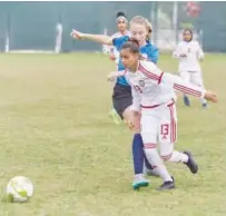  ??  ?? Players in action during a Dubai Sports Council Academies Championsh­ip match.