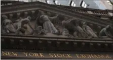  ?? MARY ALTAFFER — THE ASSOCIATED PRESS FILE ?? The New York Stock Exchange at sunset, in lower Manhattan.