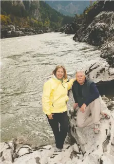  ??  ?? Wife and husband Carol and Rick Blacklaws have teamed up for The Fraser, a memoir and photo book that guides readers on a journey down the river.