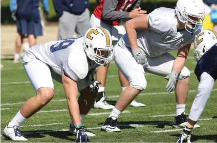  ?? UTC PHOTO ?? New UTC player Steve Pickren, left, has been enjoying a return to his original college position, tight end, after playing on both llines at UAB.