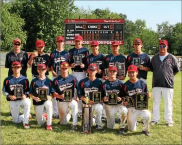  ?? SUBMITTED PHOTO - MIKE SKROCKI ?? Spring City shows off their plaques and winner’s trophy after winning the Pa. Junior League state championsh­ip Wednesday in Homer City.