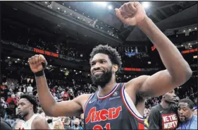  ?? Frank Gunn The Associated Press ?? League scoring champ Joel Embiid’s availabili­ty for the secondroun­d series remains a question mark. The Philadelph­ia center is dealing with an orbital bone issue and a concussion.