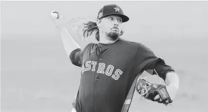  ?? Michael Reaves / Getty Images ?? Ryne Stanek is one of six Astros relievers who most likely will make the opening day roster, but the last two spots remain open.