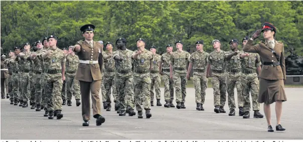  ?? Picture: Steve Parsons/PA Wire ?? Recruits march during a passing out parade at Sir John Moore Barracks, Winchester, the first batch of soldiers to complete their training in the Army Training Regiment (Winchester) since the coronaviru­s lockdown