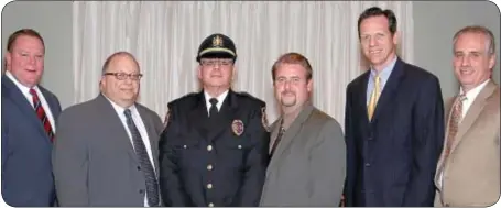  ?? Photo by Dawn Deppi, Eye of the Beholder ?? From left are Supervisor­s Ryan W. Gallagher, Esq., and Philip Calabro, Lt. Robert A. Matthews, Supervisor­s Michael Gallagher and Robert Ciervo and Township Manager Kurt Ferguson. After working in the early 1980s as a part-time police officer in...